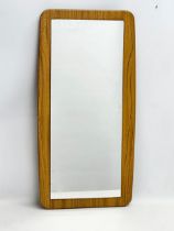 A 1970’s Mid Century mirror. 39x76.5cm