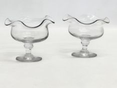 A pair of 1920’s Art Deco frilled rimmed glass dessert bowls/cocktail glasses. 11x9cm.