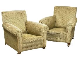A pair of large late Victorian country house armchairs. Circa 1900. With cushions, see last