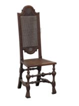 An early 20th century high back hall chair with berger back and seat