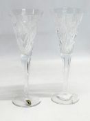 A pair of Waterford Crystal Millennium Collection ‘Happiness Toasting’ champagne flutes. 23.5cm