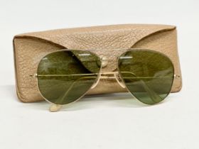 A pair of vintage Ray Ban ‘Pilot’ sunglasses with case.