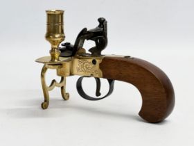 A good quality brass flintlock Tinder Pistol. Made in Italy.