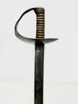 A 19th century British Naval officers sword. 72cm