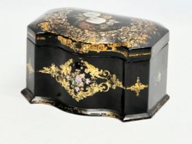 A mid 19th century Jennens & Bettridge gilt and Mother of Pearl inlaid lacquered tea caddy with