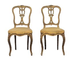 A pair of early 20th century side chairs.
