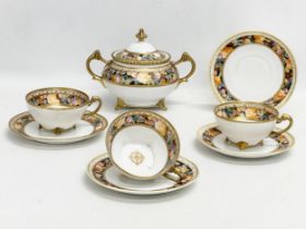 An early 20th century Japanese hand painted porcelain part tea service by Noritake.