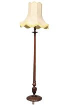 A good quality George III style mahogany standard lamp with reeded column
