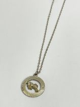 A silver necklace. 4.16 grams.