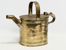 An Edwardian brass watering can. 34x14x27cm