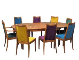 A G-Plan Fresco Mid Century teak extendable dining table and 8 chairs, designed Victor Wilkins.