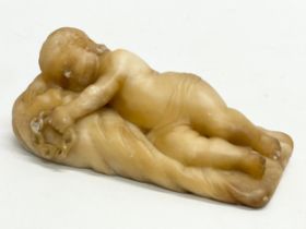 A 19th century Alabaster ‘Sleeping Cupid’ 13x6cm