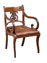 A good quality Regency mahogany armchair on sabre legs. Circa 1810.