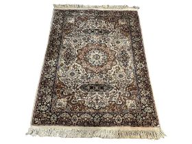 A vintage Middle Eastern rug. 123x206cm