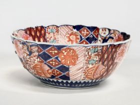 A large late 19th century Japanese, late Meiji period bowl in the Imari pattern. Circa 1880. 30x12cm