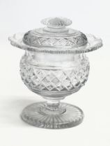 An early 19th century Irish Regency period cut glass sweetmeat jar with cover. Circa 1810. 12x14cm