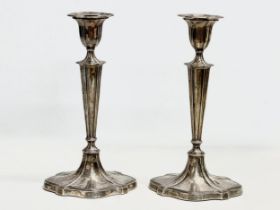 A pair of large sterling silver Hawksworth, Eyre & Co Ltd candlesticks. Early 20th century, 1901.