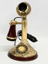 A vintage style brass telephone.