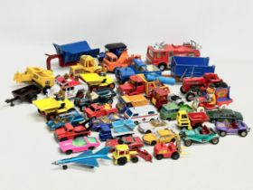 A collection of model cars and trucks etc. dinky, Britains, Matchbox and Corgi.