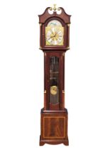 An inlaid mahogany long case clock with a brass moon dial face by James Stewart & Sons, Armagh. With