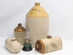 A collection of vintage stoneware with oil lamp. Largest measures 55cm