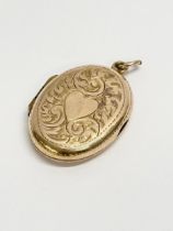A 9ct gold locket pendant. 2.65 grams.