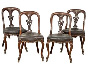 A set of 4 good quality Victorian mahogany spoon back dining chairs with original leather seats on