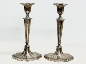 A pair of large sterling silver Walker & Hall candlesticks. Late 19th century. 16x13x30cm