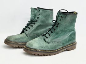 A pair of Dr Martens Air Wair boots.