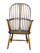 An Ercol Mid Century elm and beech Windsor armchair. Model 472.