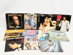 A collection of LP, vinyl records. The Beach Boys 20 Golden Greats. Elvis x5, ABBA x2, Bay City