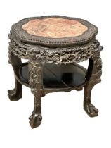 A large late 19th century Burmese carved padauk jardiniere stand/lamp table with marble top. Circa