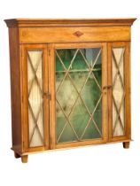 A large good quality early 20th century Sheraton Revival inlaid mahogany gun cabinet with 3 astragal
