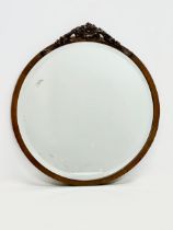 An early 20th century mahogany framed bevelled mirror. 49x53.5cm
