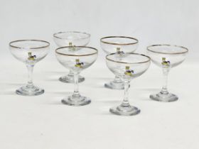 A set of 6 vintage Babycham cocktail glasses. 9x11cm