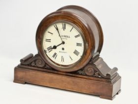 A late 19th century mahogany boardroom clock. A.D. Neill Limited, Belfast. With pendulum. 47x15x35.