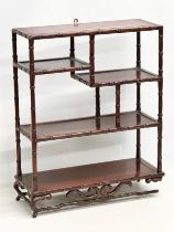 A vintage Chinese rosewood tabletop bogu display stand with bamboo style supports. 48x20x58cm