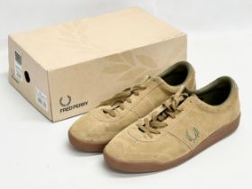 A pair of Fred Perry trainers with box. Size 10.