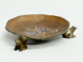 An early 20th century McClelland Barclay bronze Lily Pad dish with frog feet. 13x12cm