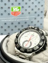 A gents Tag Heuer Formula 1 watch with case. CAH1111 NQ7557.