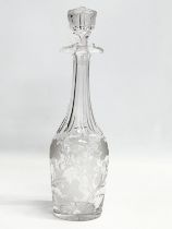 A good quality early 20th century etched glass decanter with stopper. Decorated with leaves