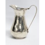 A late 19th century Cornelius Saunders and Francis Shepherd silver cream jug. Birmingham. 57.98