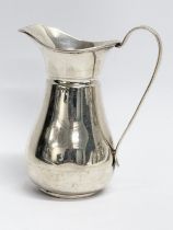 A late 19th century Cornelius Saunders and Francis Shepherd silver cream jug. Birmingham. 57.98