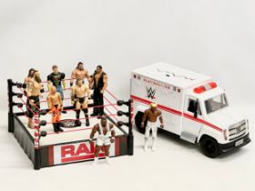 Mattel 2020 WWE collection. A Raw WWE wrestling ring with 9 figures and a WWE ambulance. Ring