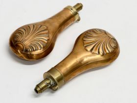 A pair of 19th century gun powder flasks. 19cm