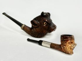 2 late 19th/early 20th century character smoking pipes. 15cm