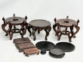 A quantity of Chinese/Japanese wooden pot stands. Largest pair 29x29x21cm