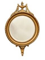 A vintage Regency style gilt framed mirror. 39.5x64cm