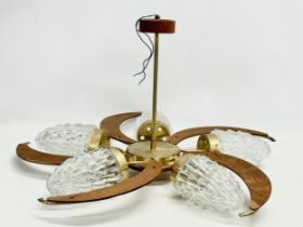 A large 1960’s Mid Century teak and brass ceiling light fitting with 5 glass shades. 69x38cm