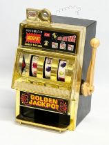 A Waco jackpot slot machine. 27cm